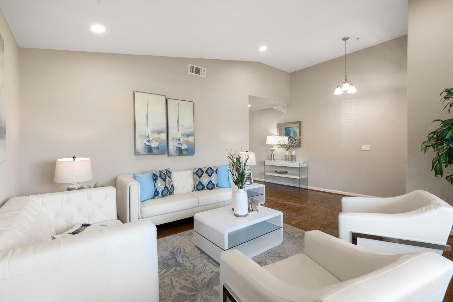 1363 Rincon Avenue Livermore, CA 94551 - Photo 10 of 65 a living room with furniture and a potted plant
