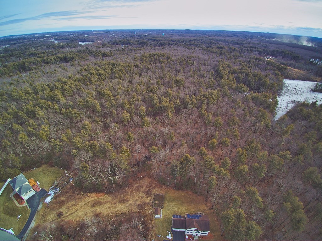 24 Old Tyng Road Tyngsborough, MA 01879 - Photo 11 of 15 a view of a yard with an outdoor space
