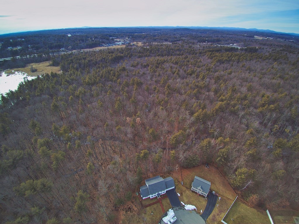 24 Old Tyng Road Tyngsborough, MA 01879 - Photo 6 of 15 a view of a city with sunset view