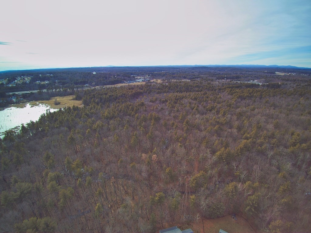 24 Old Tyng Road Tyngsborough, MA 01879 - Photo 8 of 15 a view of a room with an empty space and a window
