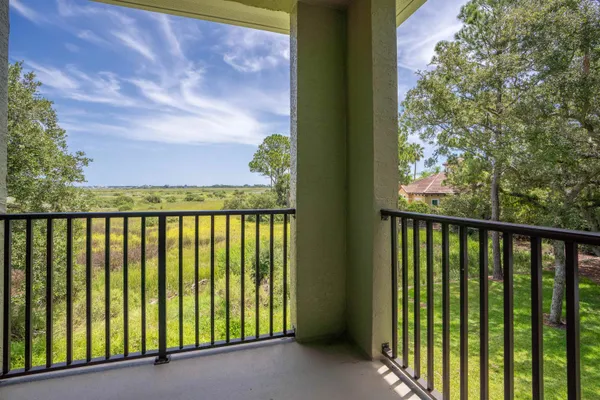 a view of a street from a balcony