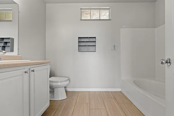 a bathroom with a sink and a toilet