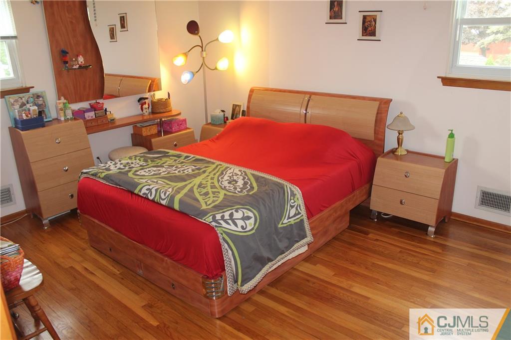 7 Lydia Lane Edison, NJ 08817 - Photo 13 of 17 a bedroom with bed and window