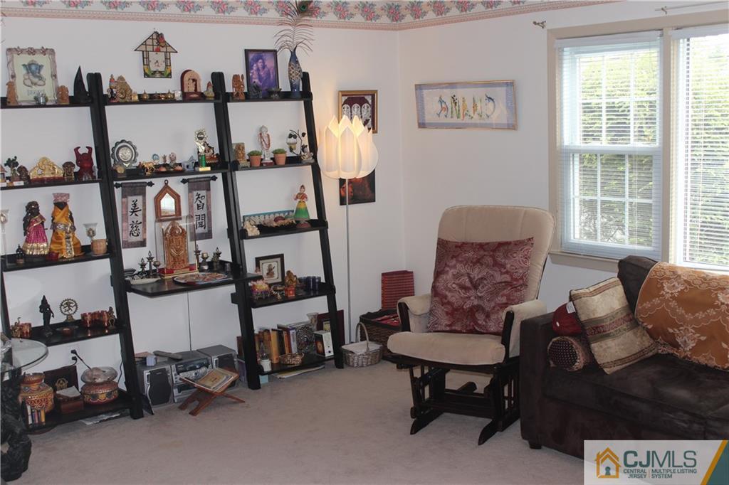 7 Lydia Lane Edison, NJ 08817 - Photo 7 of 17 a living room with furniture and a window