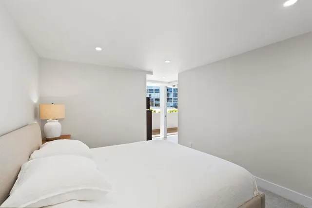 a bedroom with a bed and closet