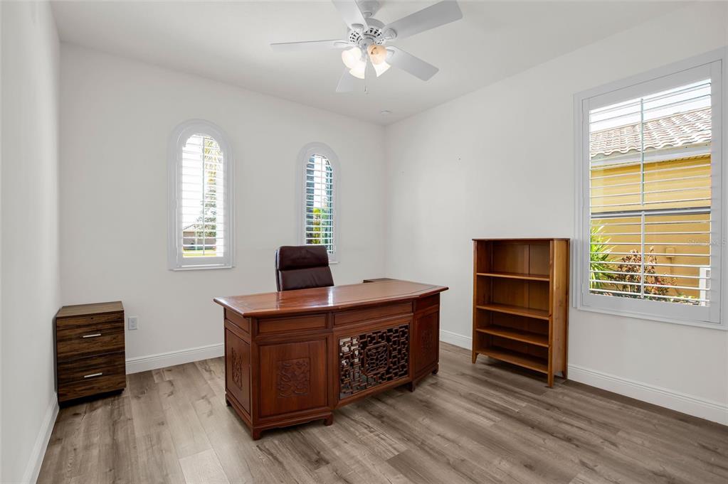 531 Villa Park Road Kissimmee, FL 34759 - Photo 16 of 63 a view of a workspace with furniture and a window