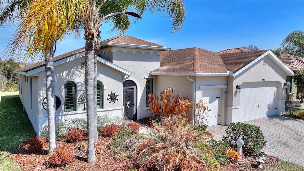 531 Villa Park Road Kissimmee, FL 34759 - Photo 34 of 63 a front view of a house with garden