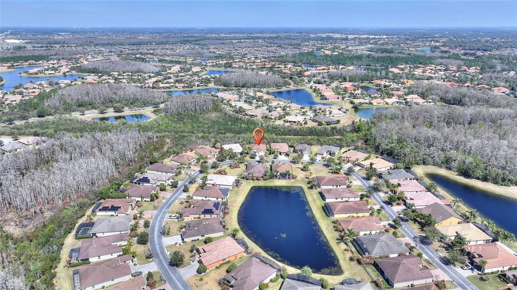531 Villa Park Road Kissimmee, FL 34759 - Photo 41 of 63 an aerial view of a house with a lake view