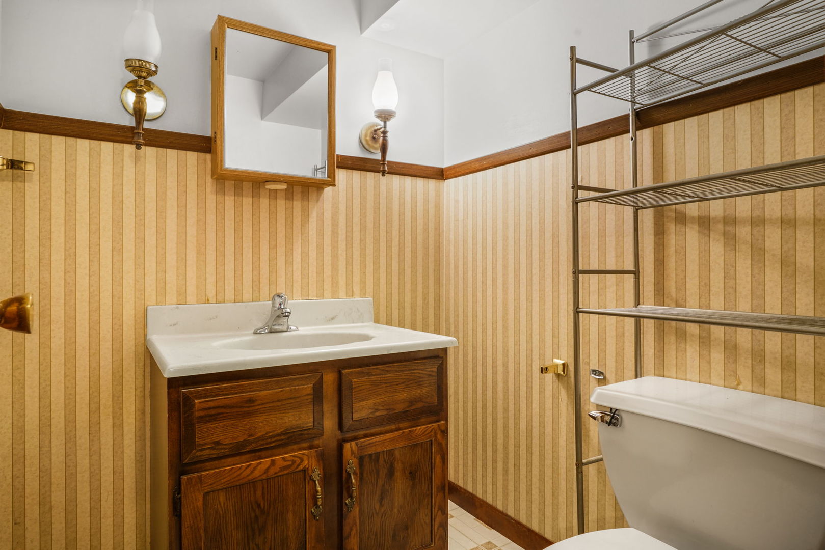 1110 Olive Road Homewood, IL 60430 - Photo 12 of 16 a bathroom with a sink toilet and shower