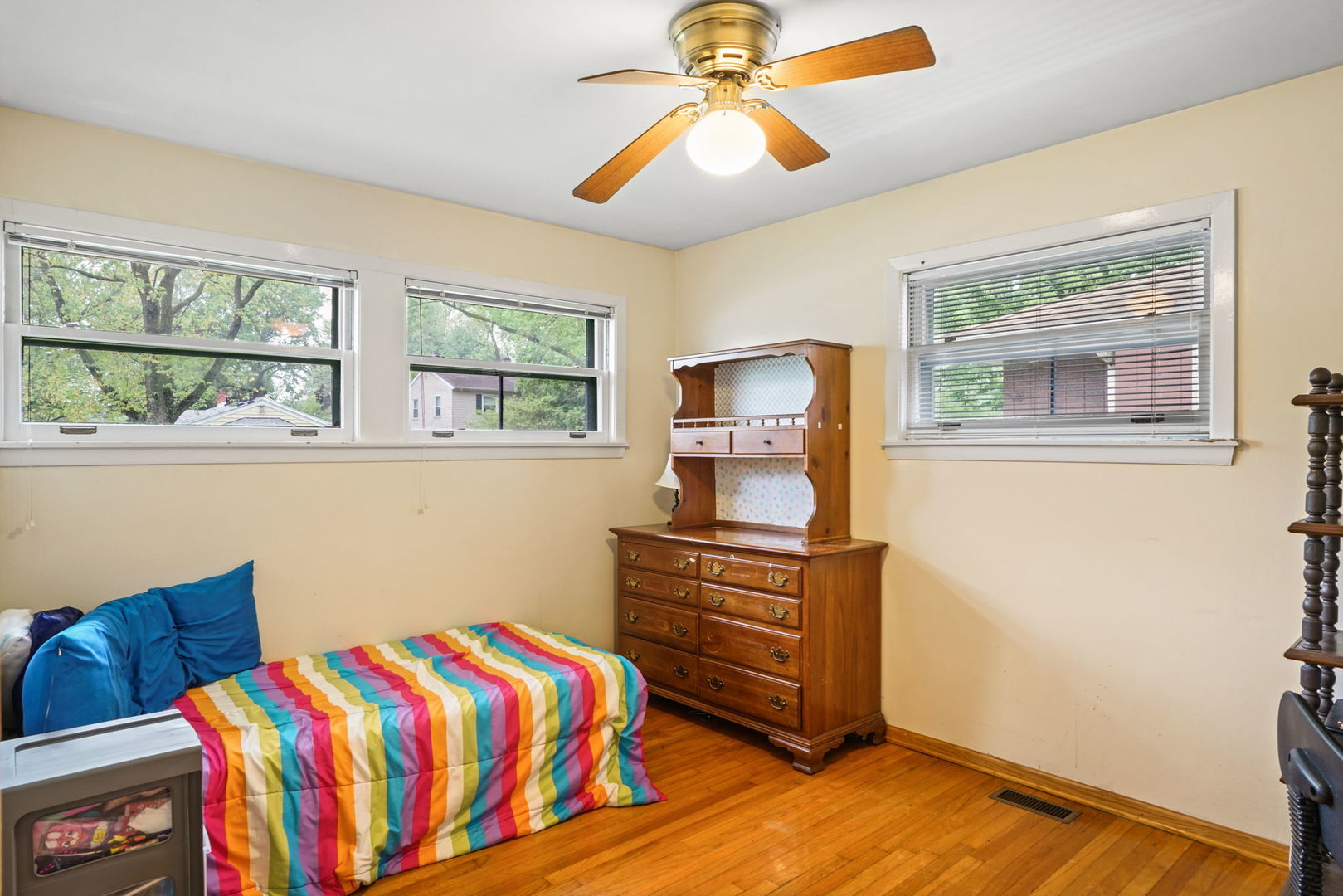 1110 Olive Road Homewood, IL 60430 - Photo 6 of 16 a bedroom with a bed and wooden floor