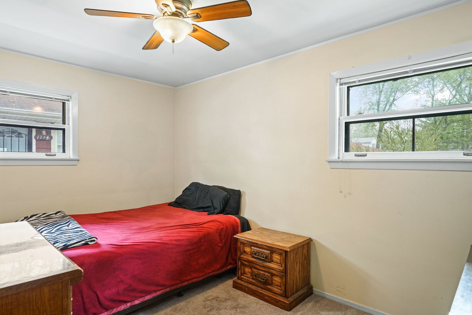 1110 Olive Road Homewood, IL 60430 - Photo 7 of 16 a bedroom with a bed and window