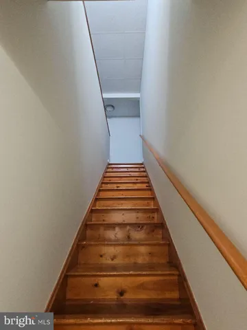 a bathroom with a sink a mirror and vanity
