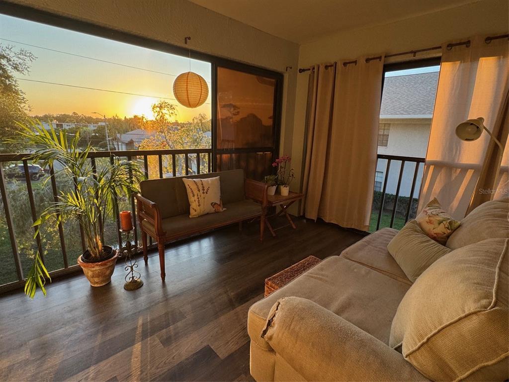 2139 Elm Street, Unit 308 Dunedin, FL 34698 - Photo 18 of 46 a living room with furniture and a window