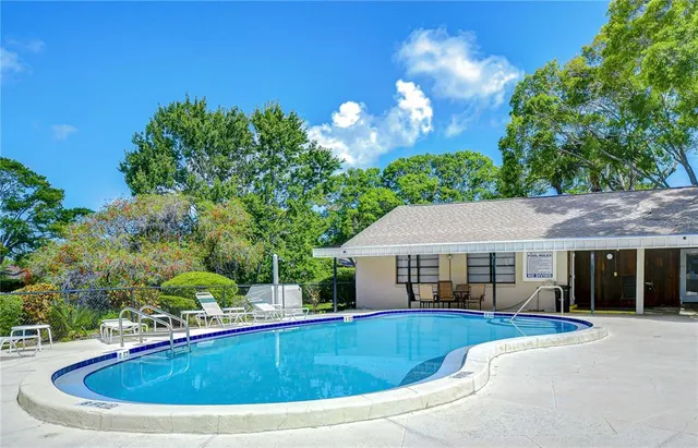 a view of a house with a swimming pool
