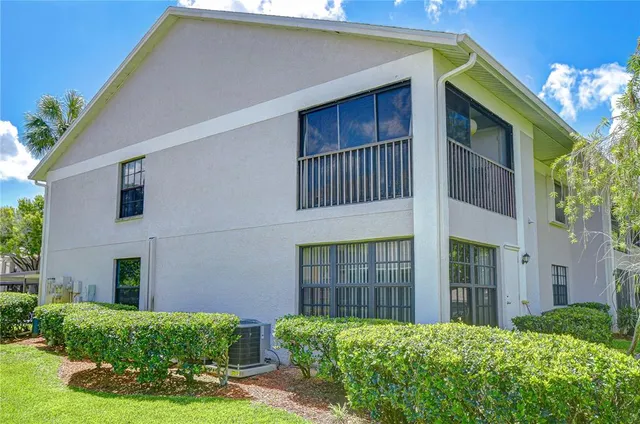 a house view with a garden space