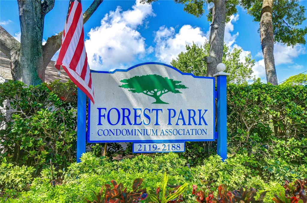 2139 Elm Street, Unit 308 Dunedin, FL 34698 - Photo 45 of 46 a sign on the side of the road