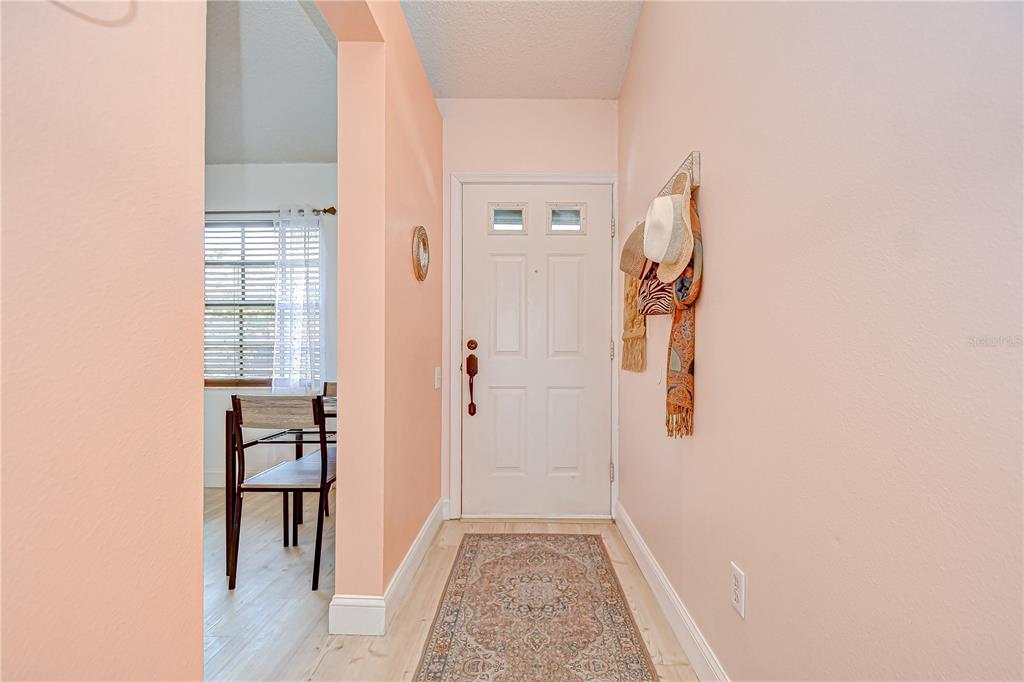 2139 Elm Street, Unit 308 Dunedin, FL 34698 - Photo 7 of 46 wooden floor in a gallery