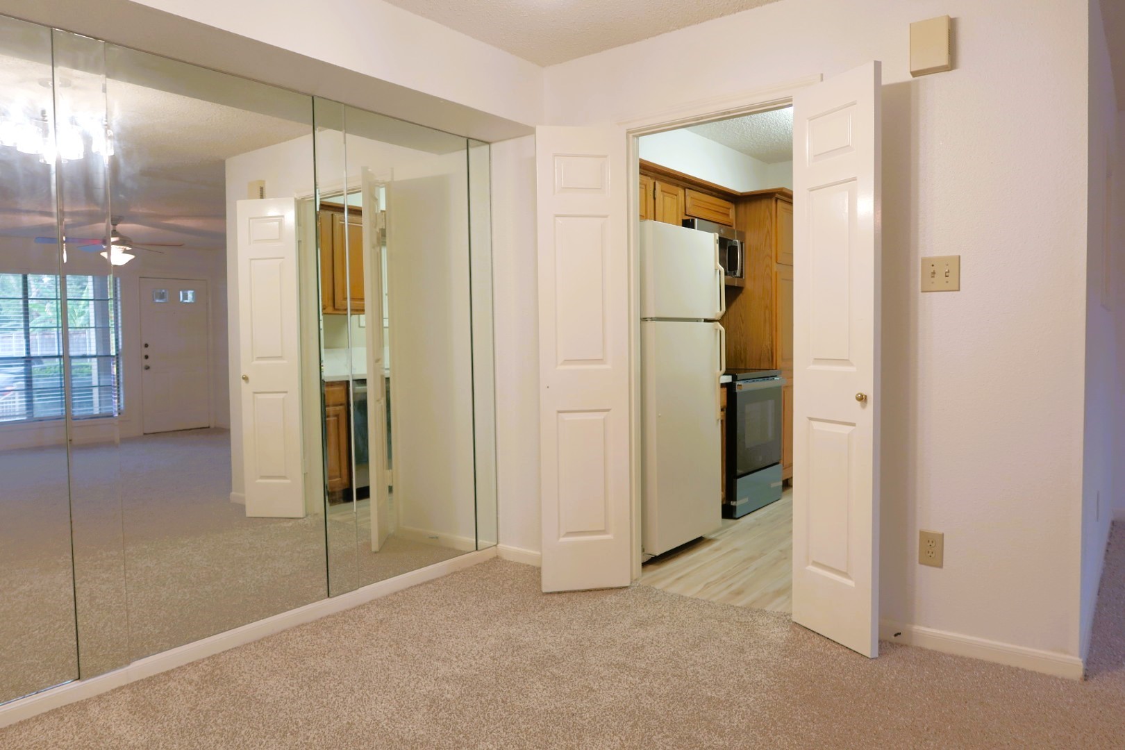 1311 Antoine Drive, Unit 251 Houston, TX 77055 - Photo 11 of 30 wooden floor and closet area in a bathroom
