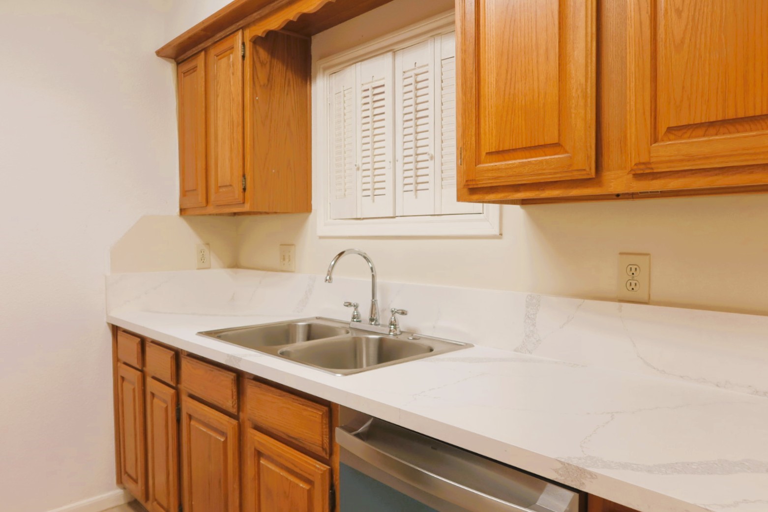 1311 Antoine Drive, Unit 251 Houston, TX 77055 - Photo 14 of 30 a kitchen with a sink and cabinets
