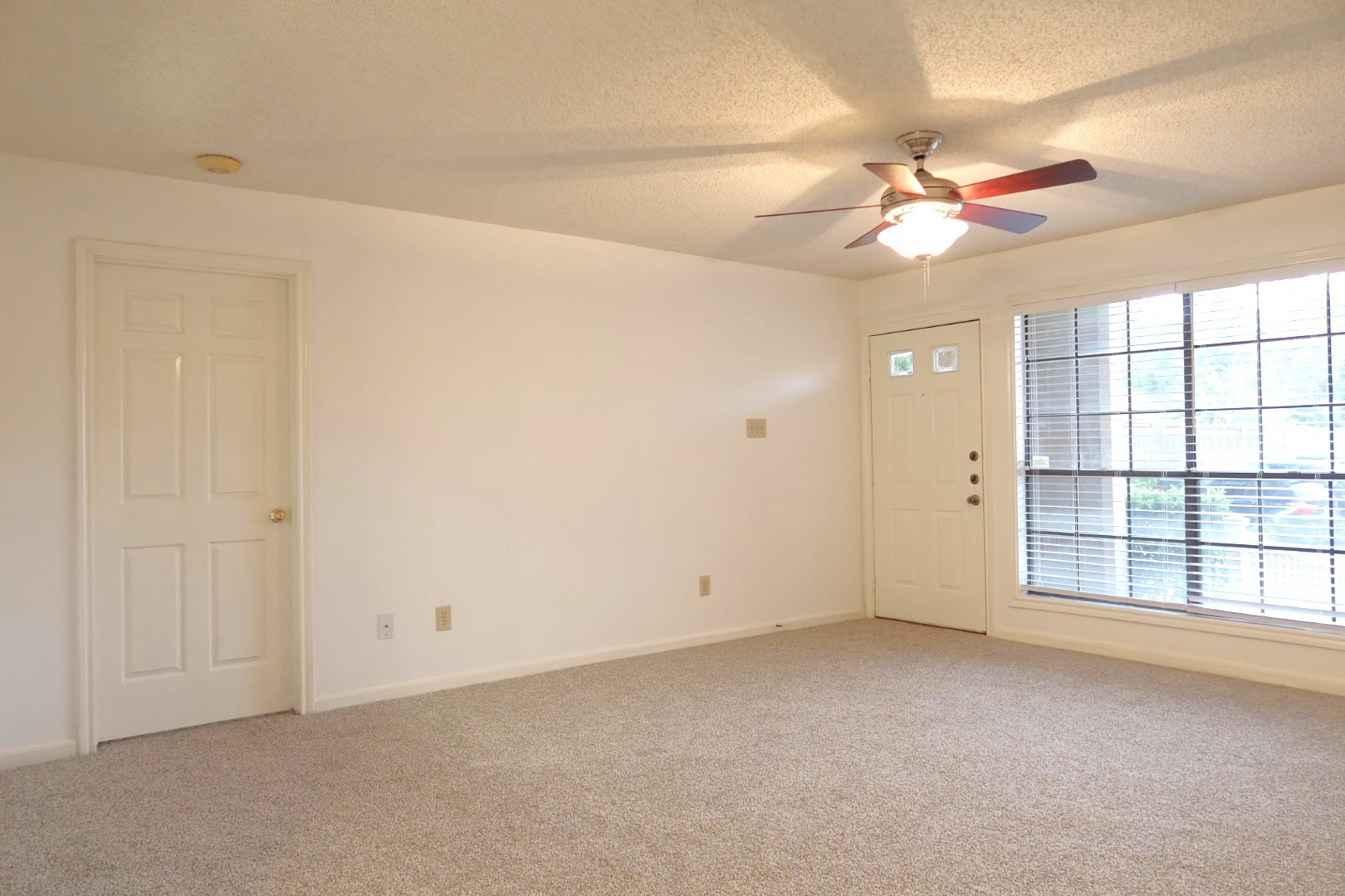 1311 Antoine Drive, Unit 251 Houston, TX 77055 - Photo 4 of 30 a view of an empty room with a window
