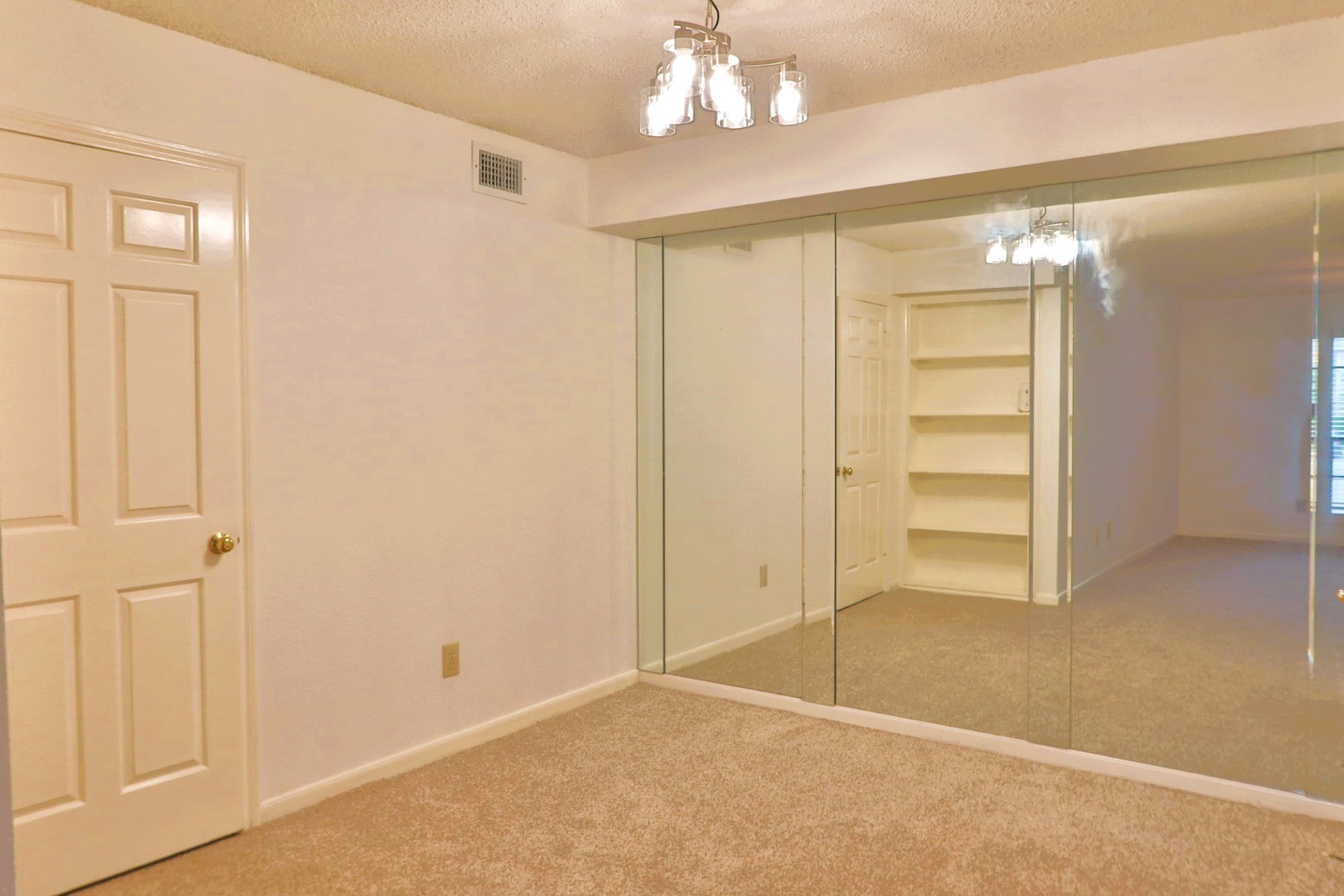 1311 Antoine Drive, Unit 251 Houston, TX 77055 - Photo 8 of 30 an empty room with closet and entryway