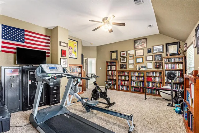 a view of a room with gym equipment