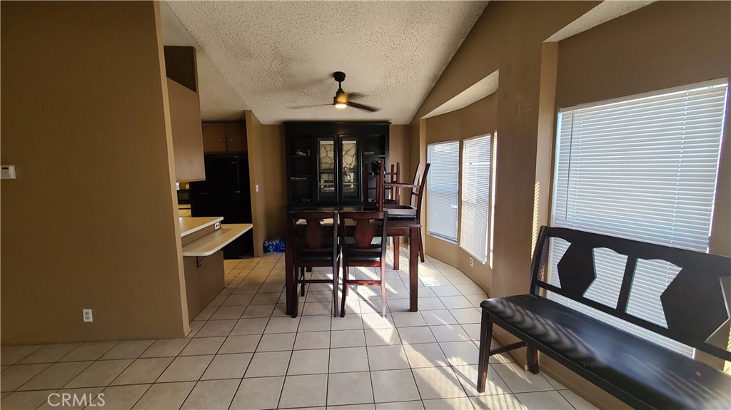 4080 Pedley Road, Unit 49 Jurupa Valley, CA 92509 - Photo 4 of 15 a view of a patio with a table and chairs