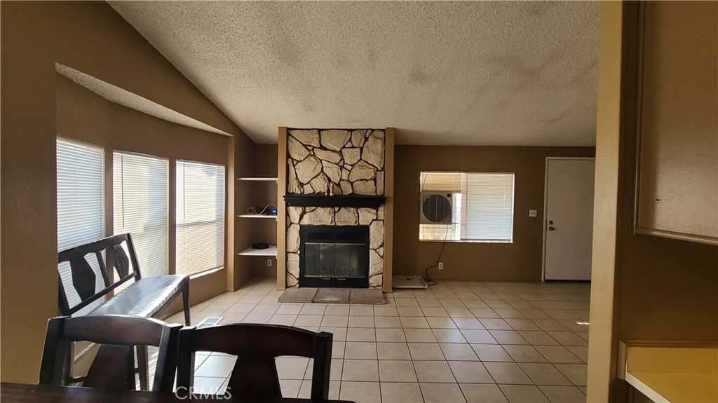 4080 Pedley Road, Unit 49 Jurupa Valley, CA 92509 - Photo 5 of 15 a view of a livingroom with furniture and a fireplace