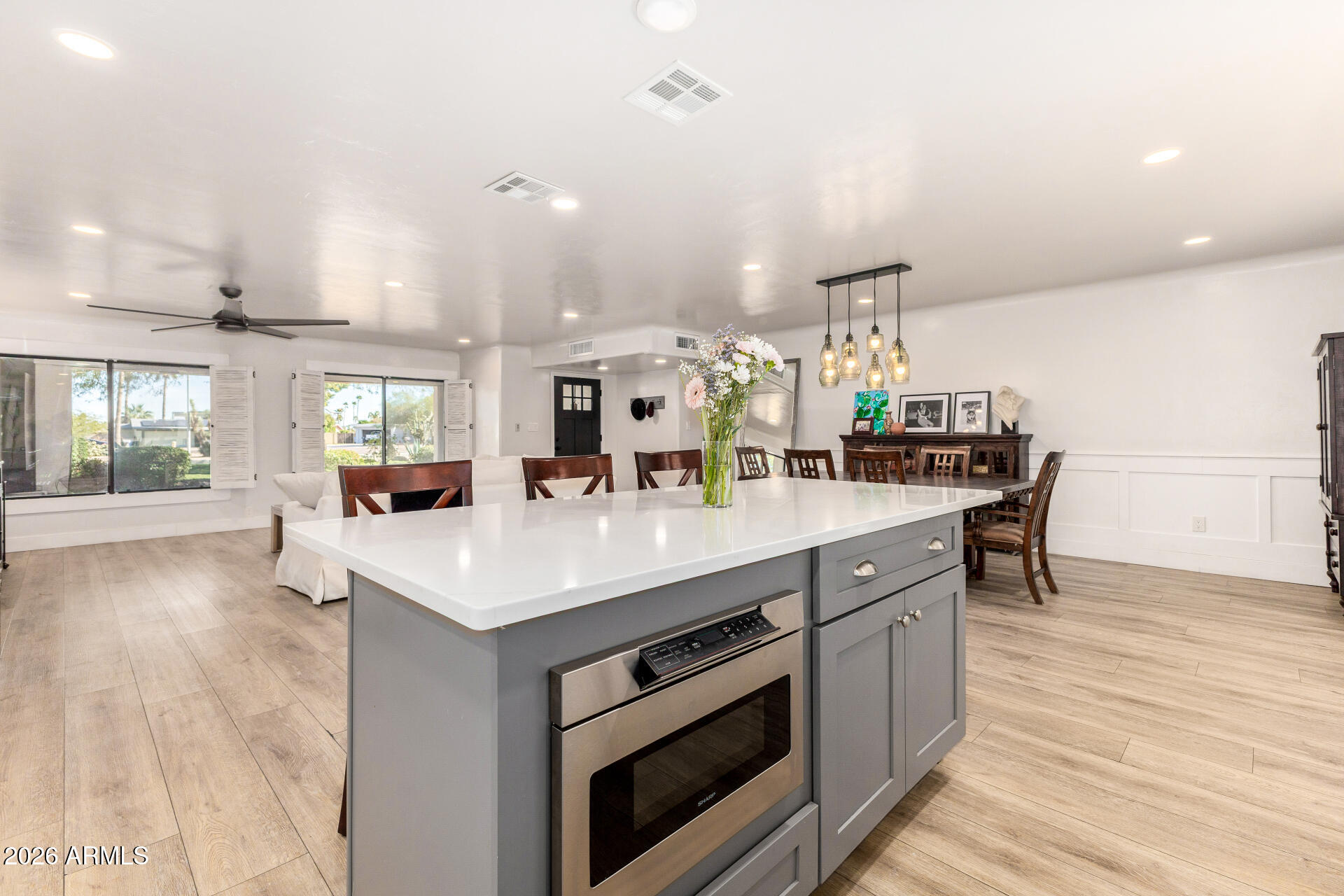 11044 North 36th Street Phoenix, AZ 85028 - Photo 15 of 62 a kitchen with a sink and a stove top oven
