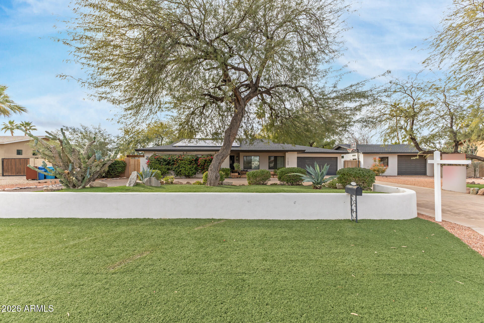 11044 North 36th Street Phoenix, AZ 85028 - Photo 2 of 62 a front view of house with yard and seating