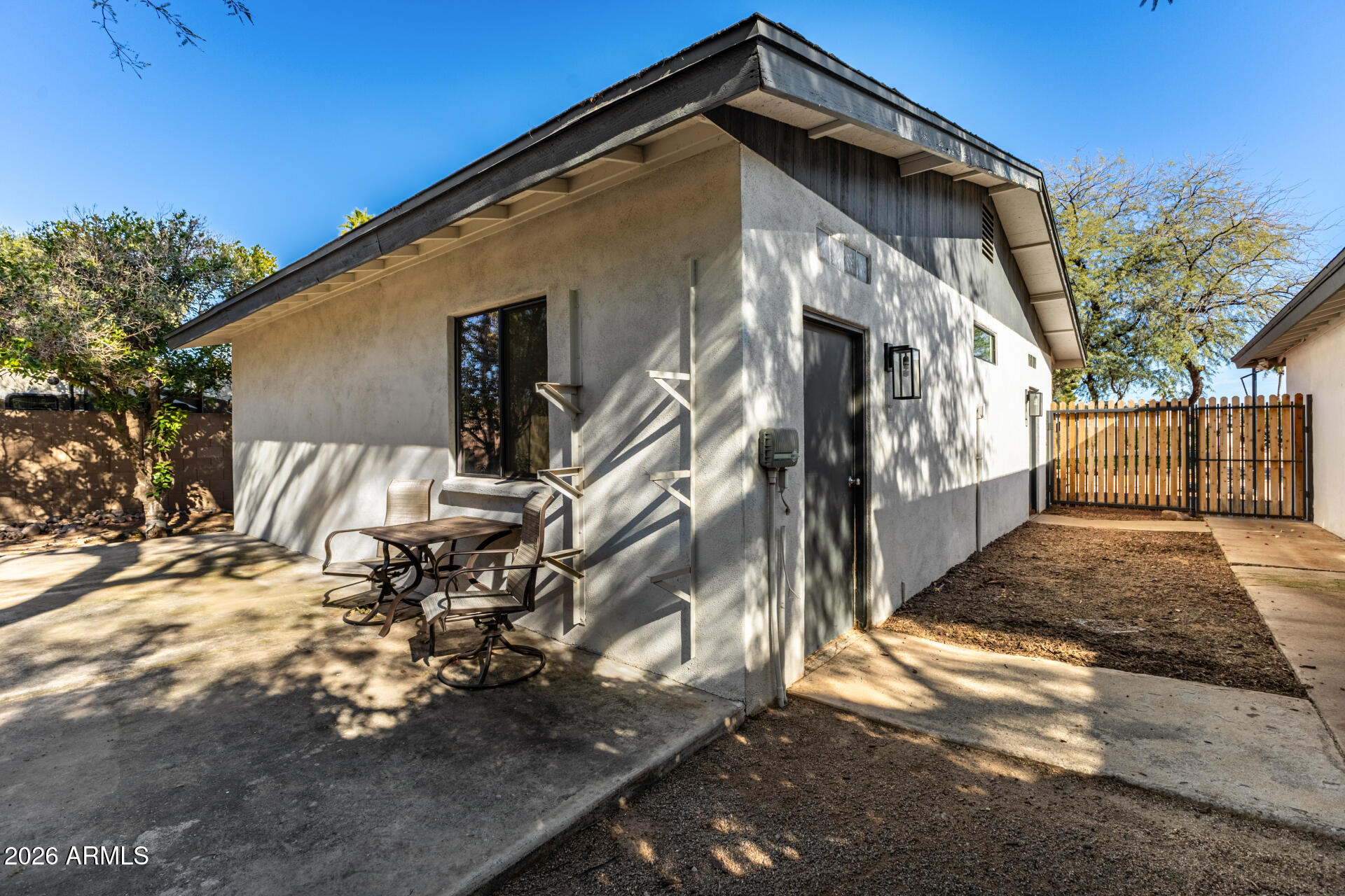 11044 North 36th Street Phoenix, AZ 85028 - Photo 49 of 62 a front view of a house with a yard