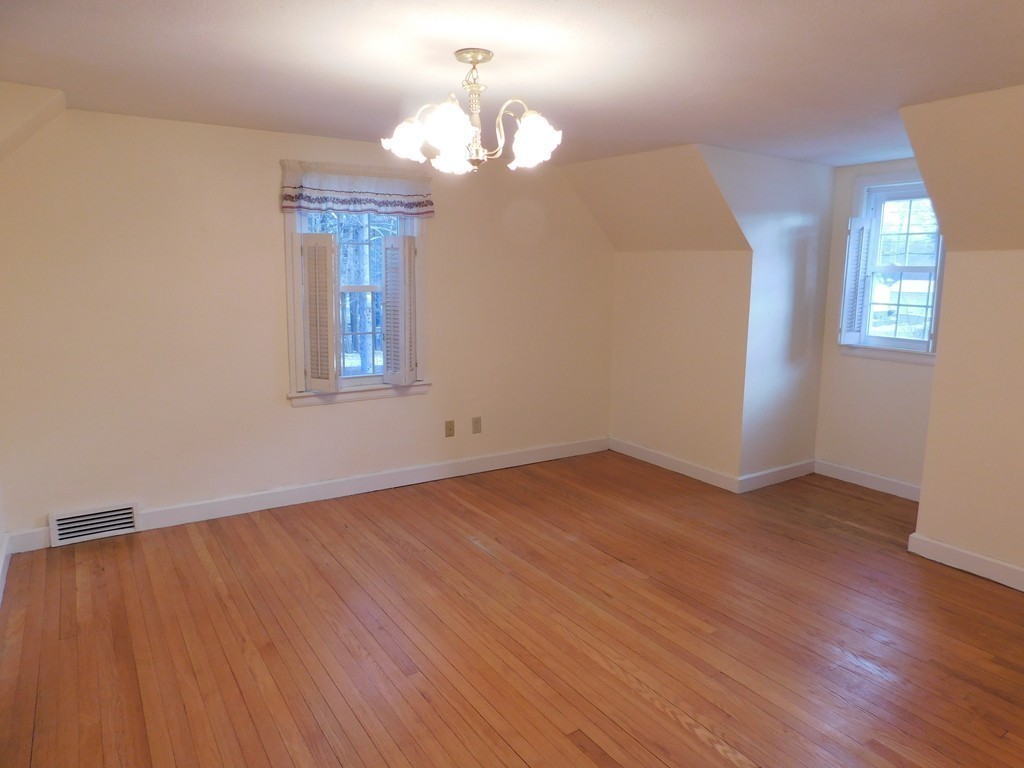 672 Amostown Road West Springfield, MA 01089 - Photo 21 of 30 wooden floor in an empty room with a window