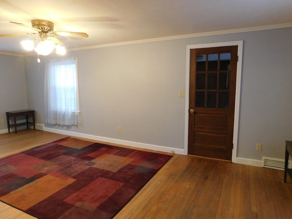672 Amostown Road West Springfield, MA 01089 - Photo 4 of 30 wooden floor in an empty room with a window