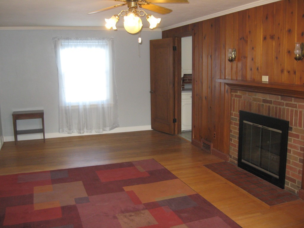672 Amostown Road West Springfield, MA 01089 - Photo 5 of 30 a view of a livingroom with a fireplace