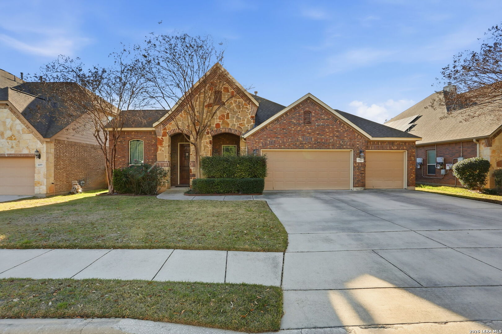 27003 Hardy Run Boerne, TX 78015 - Photo 2 of 17 front view of a house with a yard