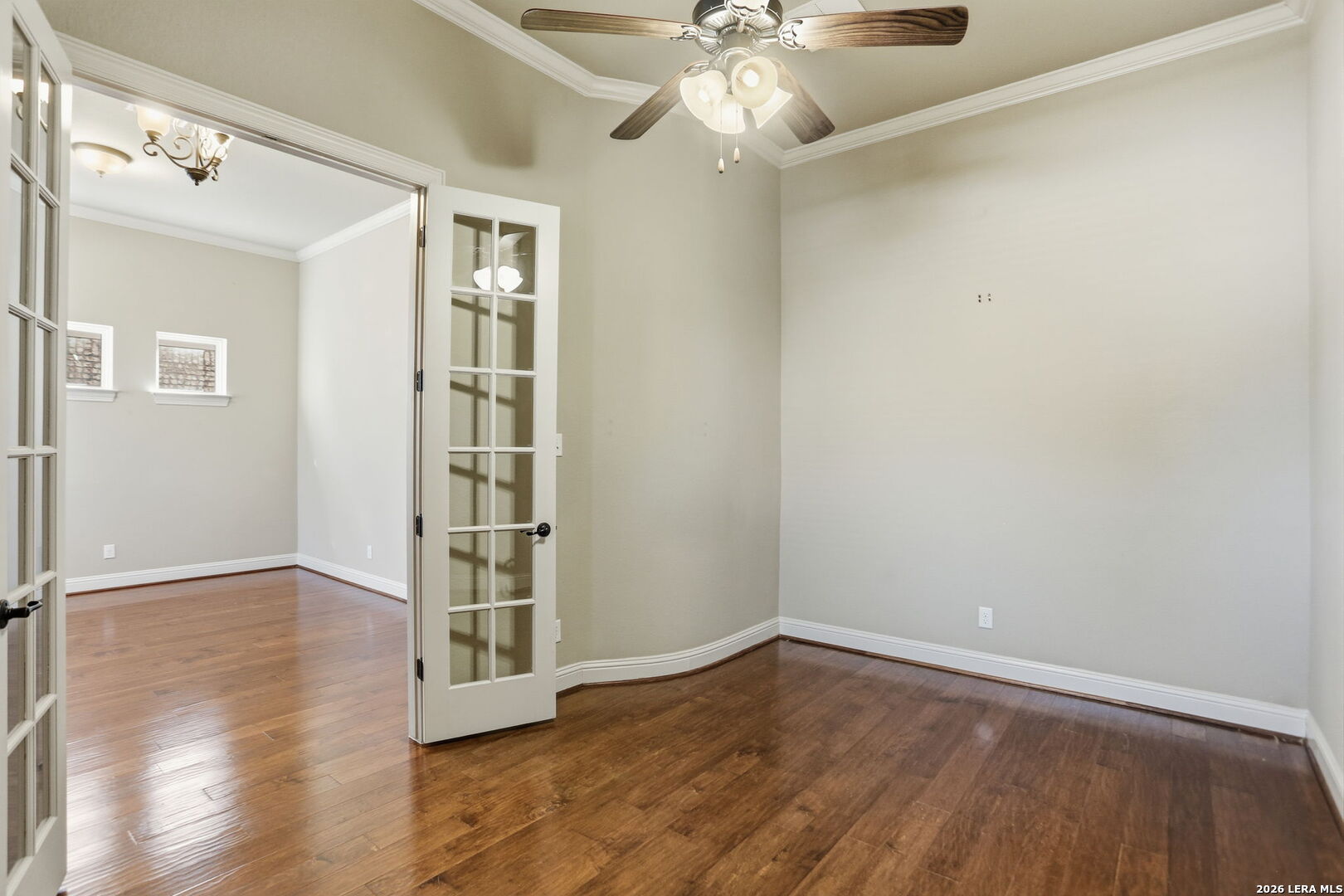 27003 Hardy Run Boerne, TX 78015 - Photo 4 of 17 wooden floor in an empty room with a window