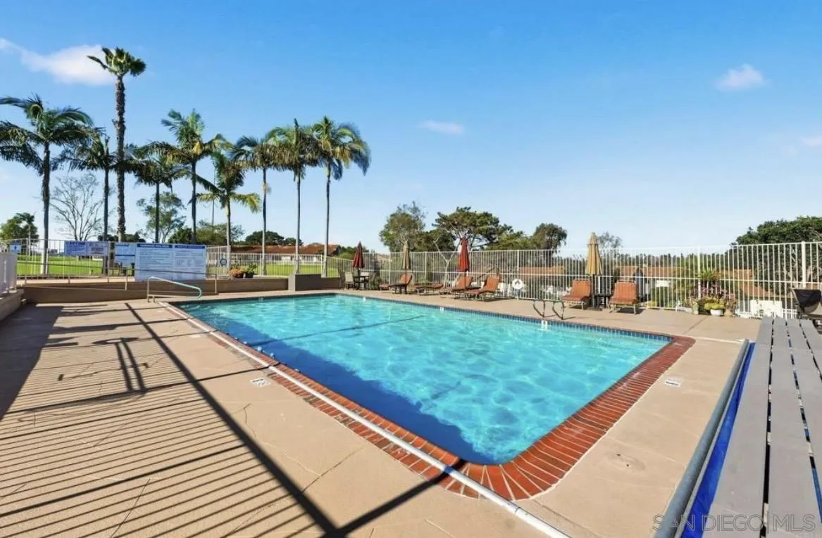 245 Fairlee Lane Encinitas, CA 92024 - Photo 13 of 18 a view of a backyard and swimming pool