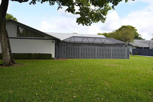 a view of a backyard with a garden