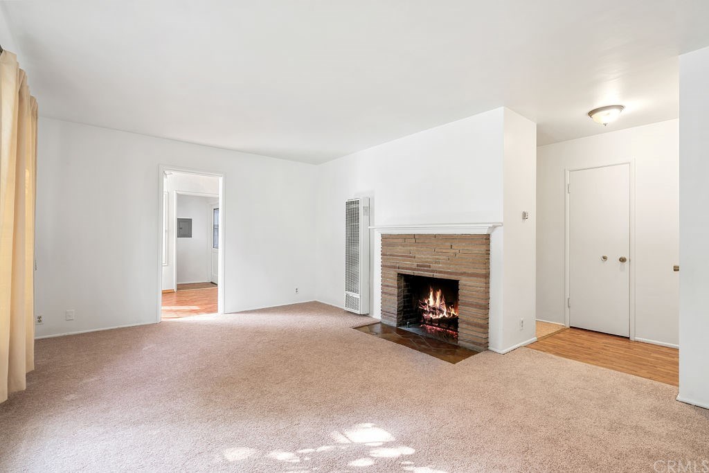 1025 La Cadena Avenue Arcadia, CA 91007 - Photo 11 of 43 Cozy fireplace in living room.