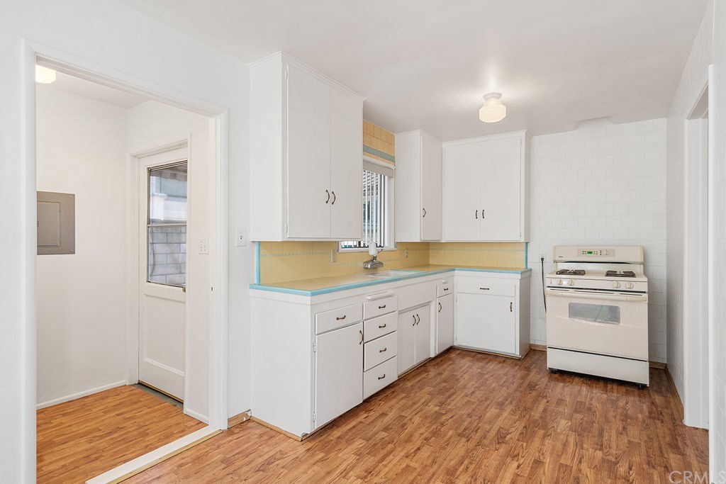 1025 La Cadena Avenue Arcadia, CA 91007 - Photo 15 of 43 Laundry room and backyard access are located just off of kitchen.