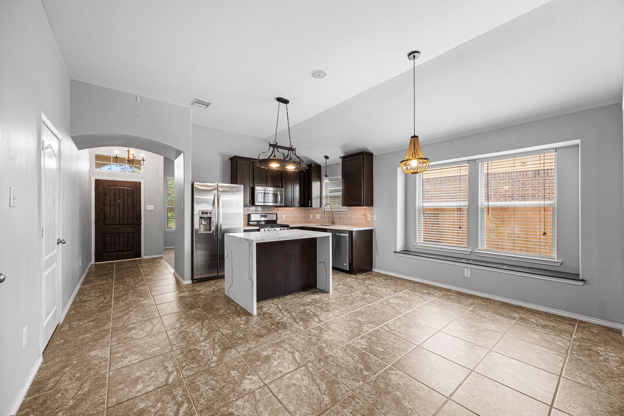 2211 Oak Rise Drive Conroe, TX 77304 - Photo 13 of 29 Open living and kitchen area