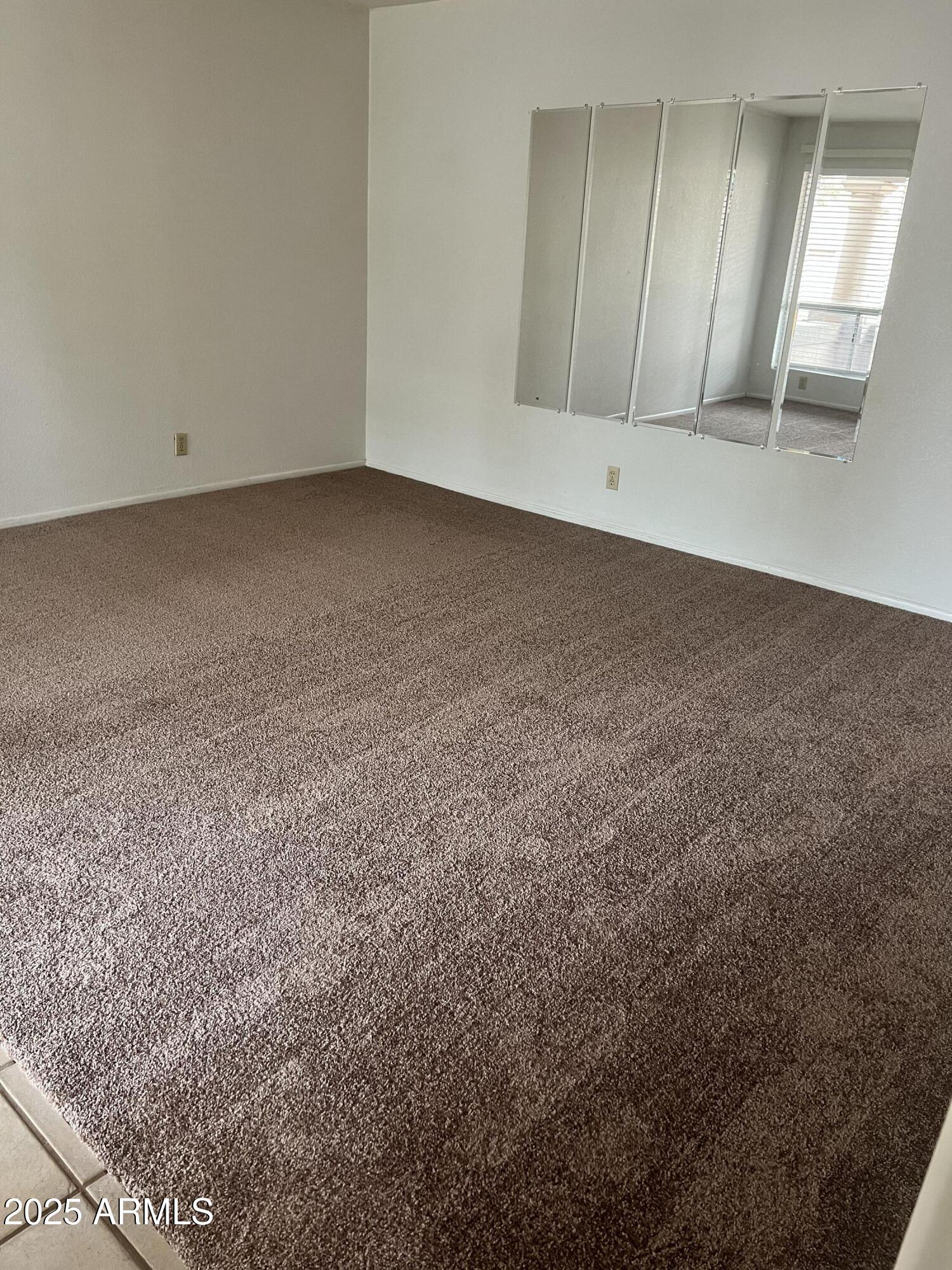99 North Cooper Road, Unit 136 Chandler, AZ 85225 - Photo 3 of 14 a view of an empty room