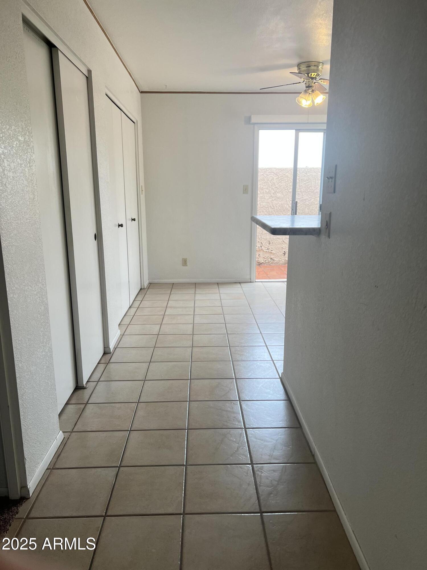 99 North Cooper Road, Unit 136 Chandler, AZ 85225 - Photo 5 of 14 a view of a bathroom with a sink and a mirror