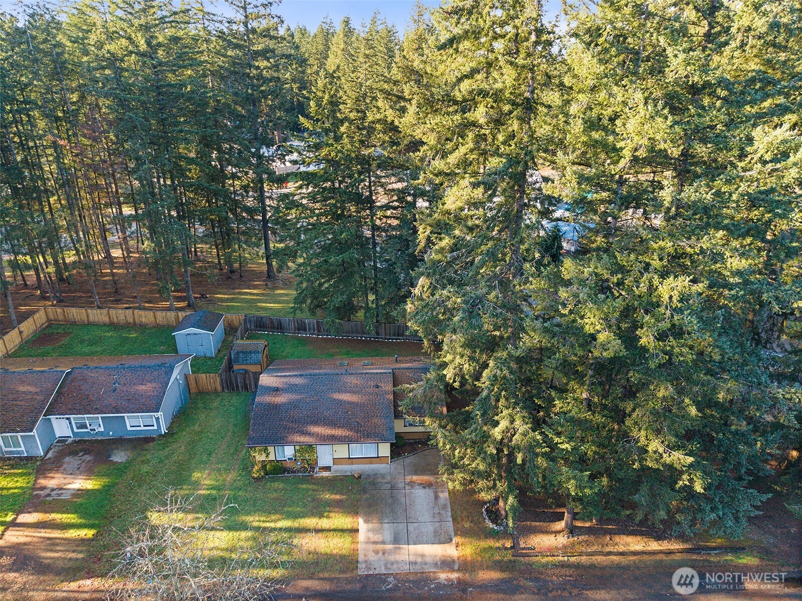 19401 Southeast 267th Street Covington, WA 98042 - Photo 27 of 31 a view of a lake with houses