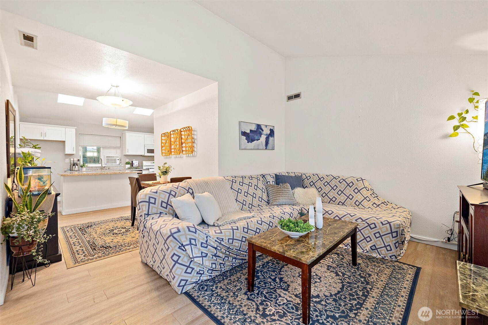 19401 Southeast 267th Street Covington, WA 98042 - Photo 4 of 31 a living room with furniture and wooden floor
