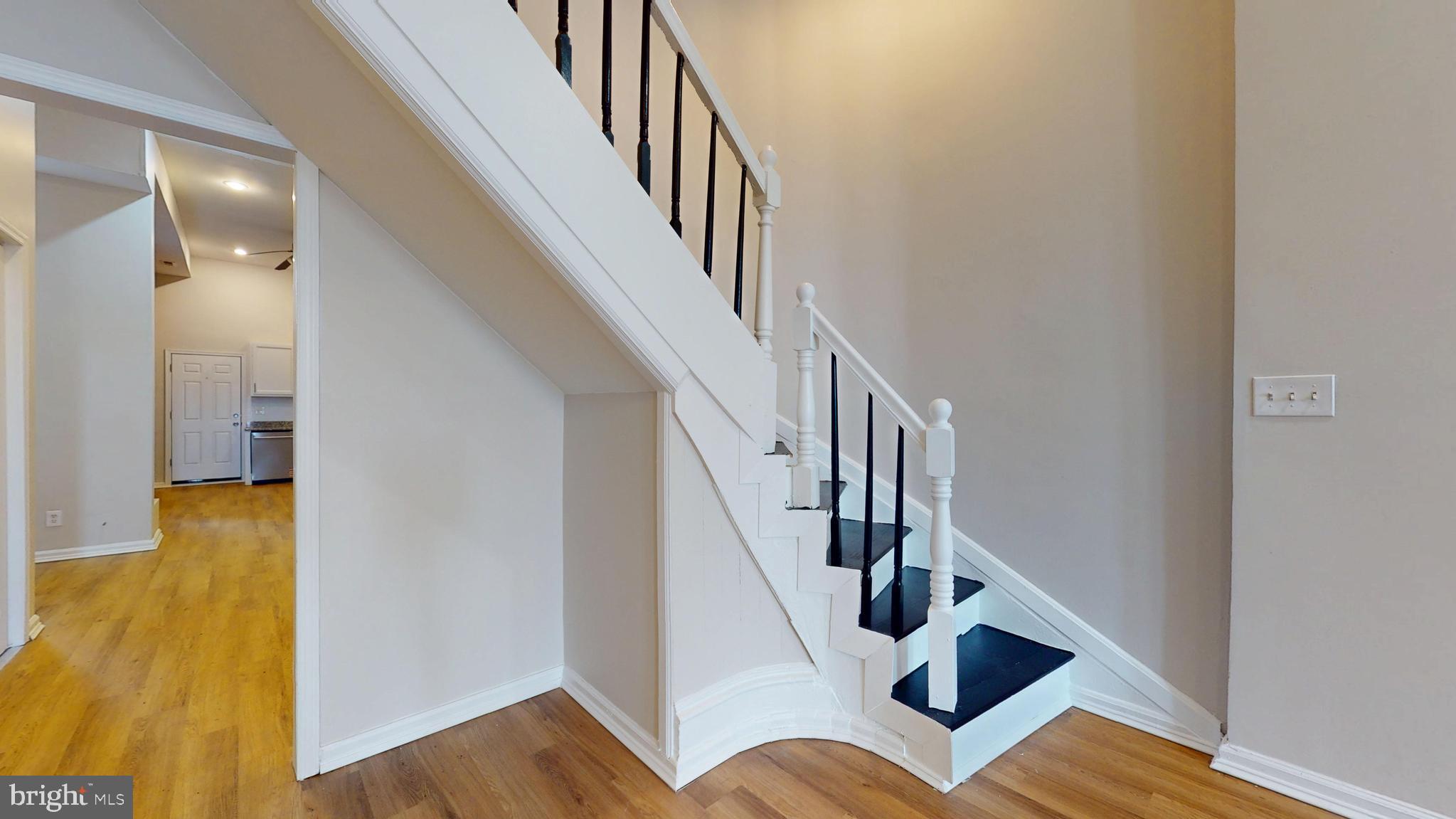 708 North Gilmor Street Baltimore, MD 21217 - Photo 11 of 35 a view of entryway and hall with wooden floor