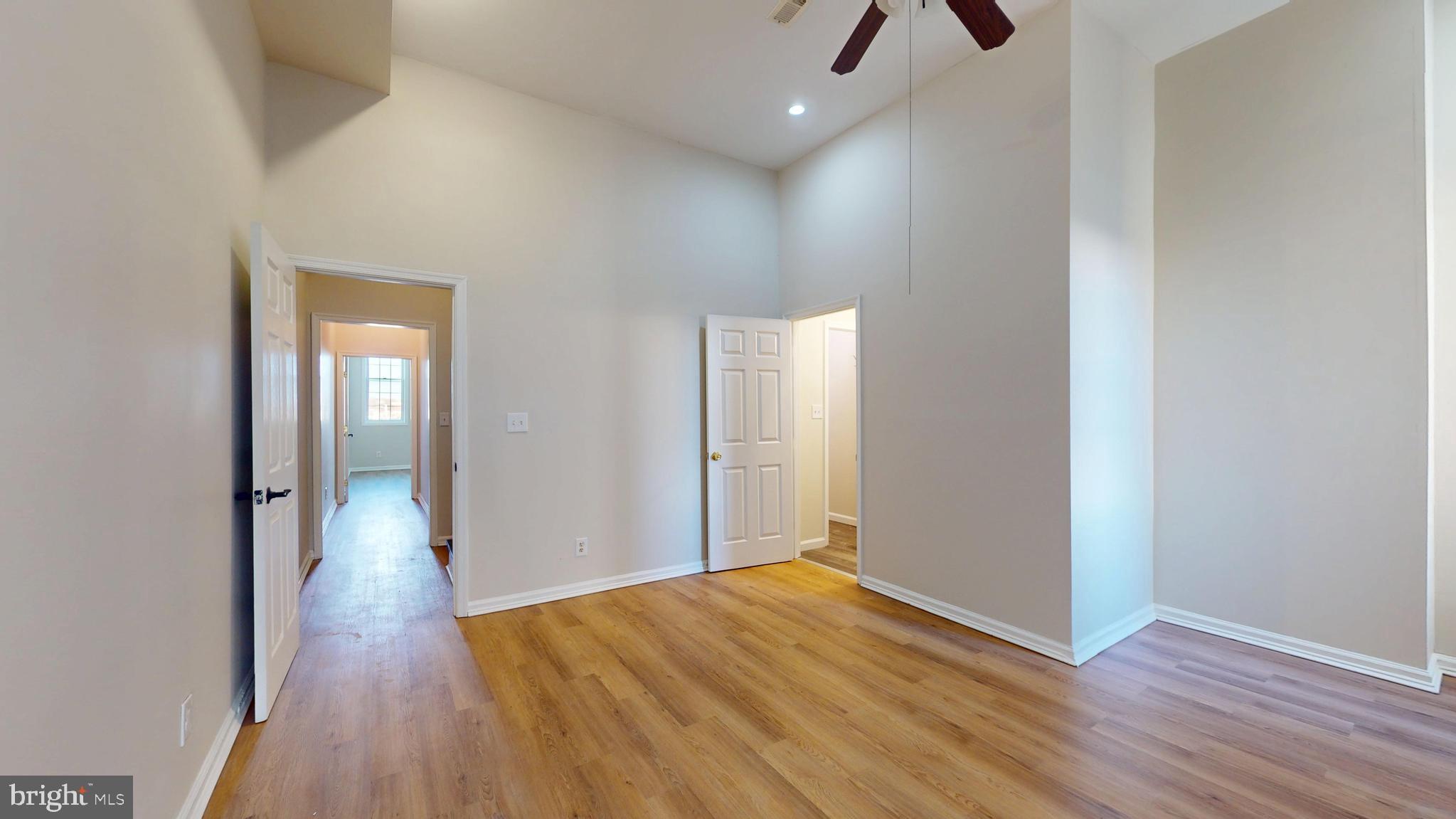 708 North Gilmor Street Baltimore, MD 21217 - Photo 20 of 35 wooden floor in an empty room with a window