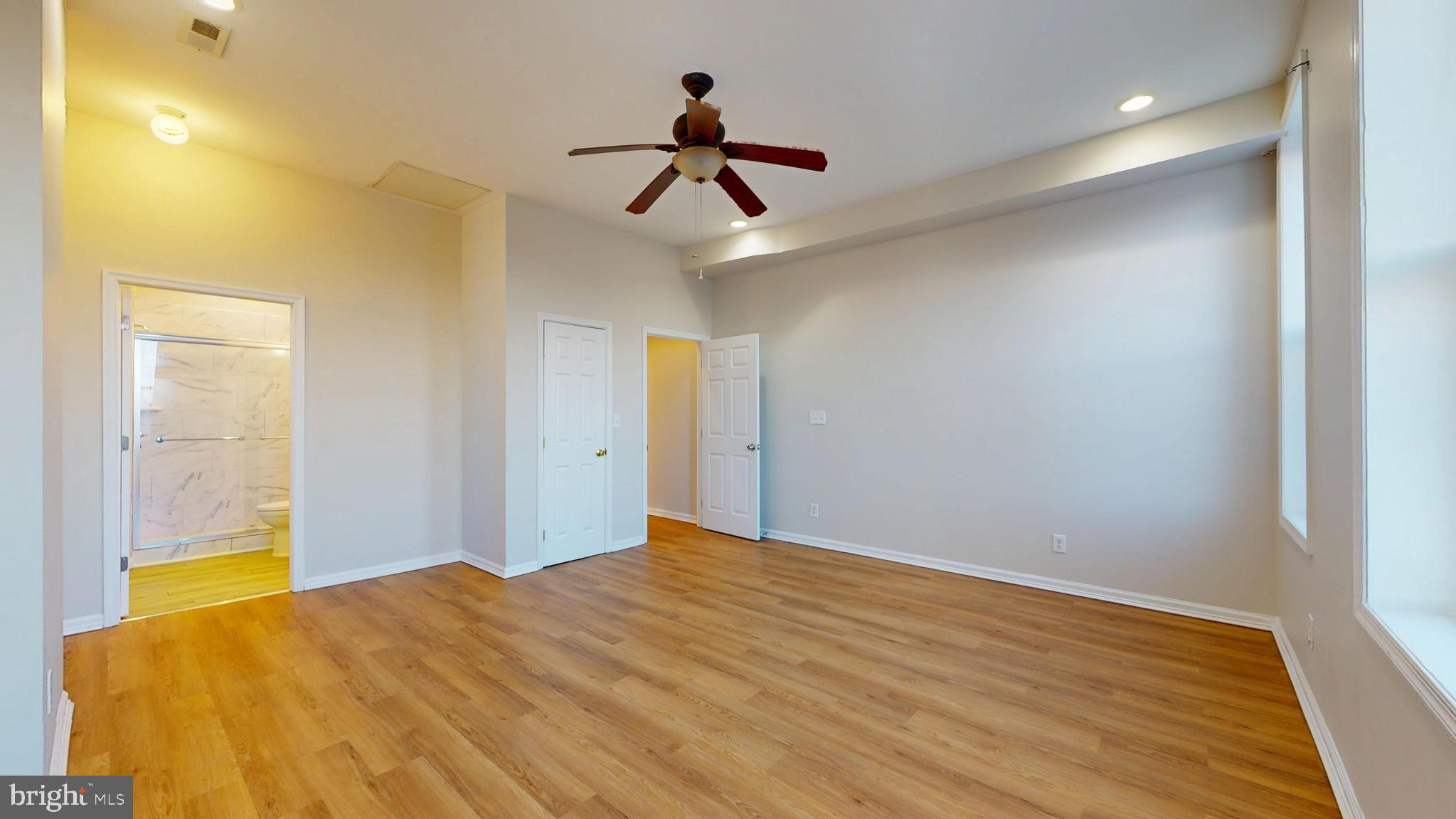 708 North Gilmor Street Baltimore, MD 21217 - Photo 25 of 35 a bedroom with a bed and a window