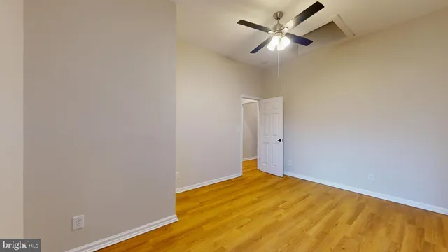a view of a big room with wooden floor