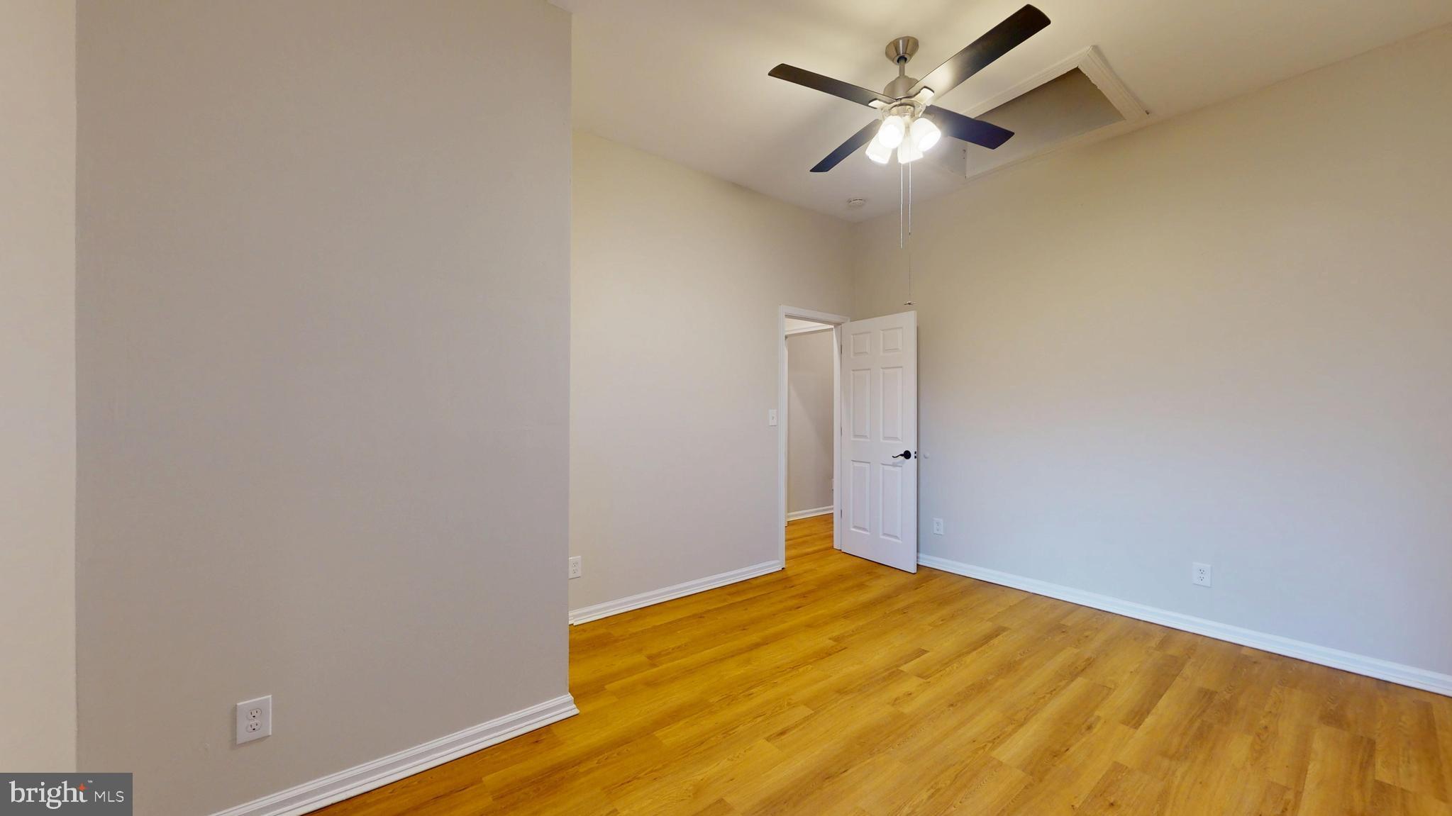 708 North Gilmor Street Baltimore, MD 21217 - Photo 28 of 35 a view of a big room with wooden floor